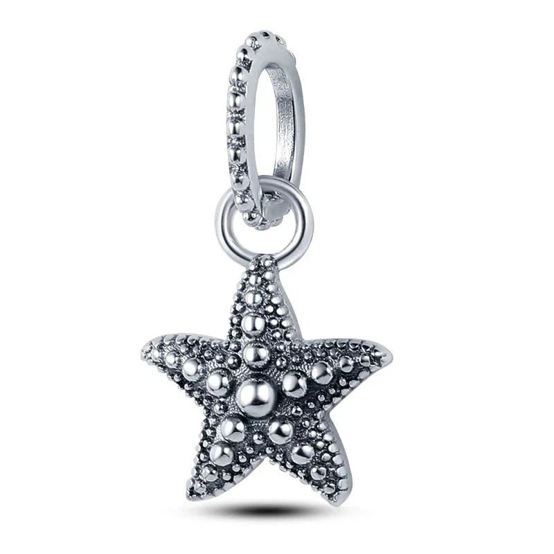 Berloque Estrela do Mar em Prata 925, inspirado na beleza do oceano, com design delicado e brilho encantador.