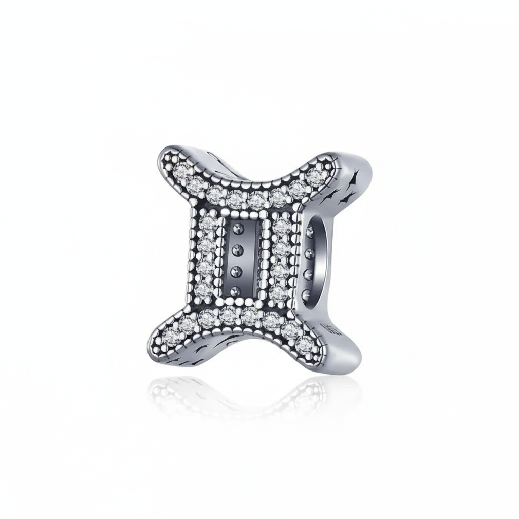 Berloque signo Gêmeos em Prata 925, símbolo de curiosidade e comunicação, ideal para personalidades criativas.