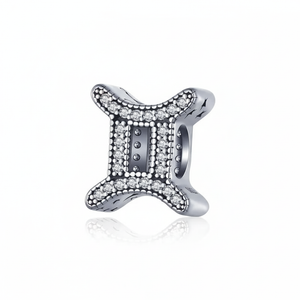Berloque signo Gêmeos em Prata 925, símbolo de curiosidade e comunicação, ideal para personalidades criativas.